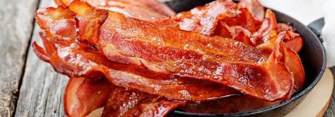 Bacon in a frying pan