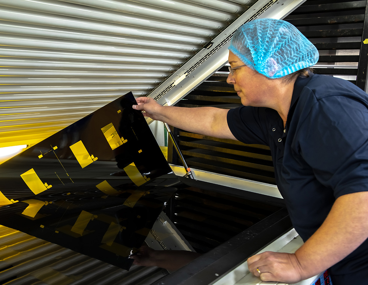 A person printing flexographic packaging