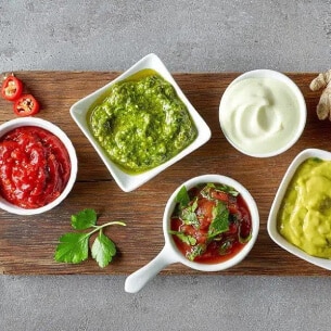 Pots with sauces and dips